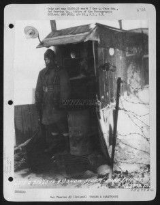 A Military Man Of The 2Nd Service Group, Stands Guard During A Snow Storm At Camp Tripoli, Iceland. 16 March 1943.