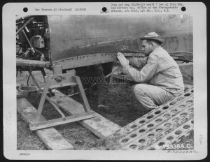 Members Of The 2Nd Service Group Salvage Usable Parts From A Curtiss P-40 Somewhere In Iceland. 26 August 1943.