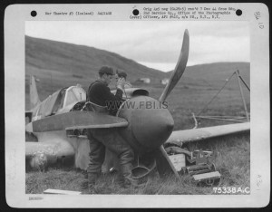 Members Of The 2Nd Service Group Salvage Usable Parts From A Curtiss P-40 Somewhere In Iceland. 26 August 1943. Fitjar skorradal