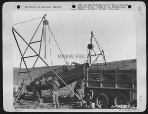 Members Of The 2Nd Service Group Salvaged Parts Of A Wrecked Curtiss P-40 Onto A Truck, Somewhere In Iceland. 26 August 1943.